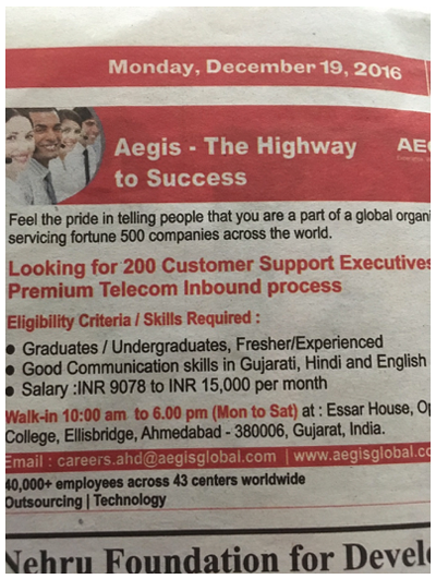 Piture of a newspaper showing a job offer for US$200 a month in an Indian call center.
