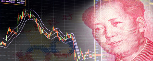 A portrait of Mao Ze Dong from a note watches over stocks